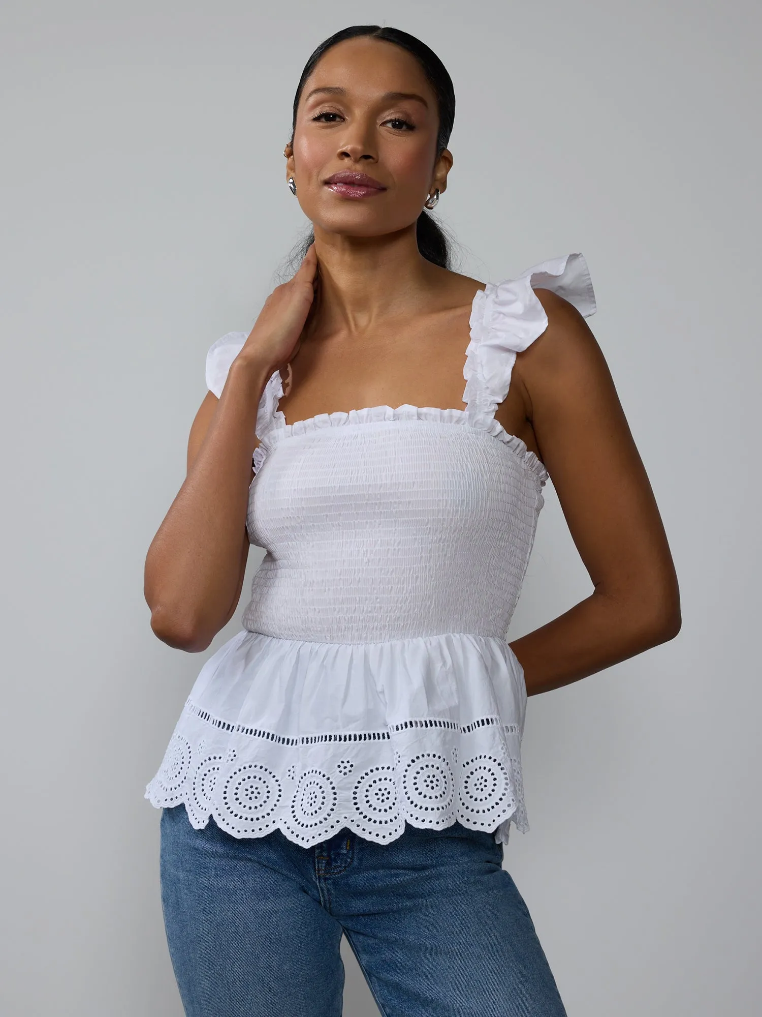 Smocked Eyelet Peplum Top